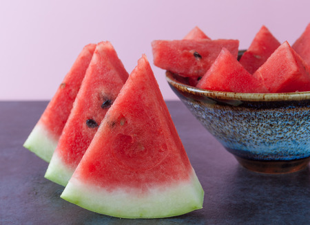 Watermelon slices extreme closeup with copy space. Shallow depth of field.