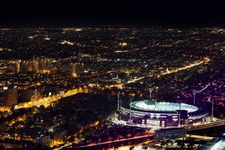 Melbourne, Australia - August 27, 2016: Aerial night view of the city and Melbourne Cricket Ground - home of Australian Football and the National Sports Museumのeditorial素材