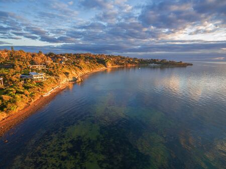 Aerial image of Mornington Peninsula coastline at sunsetの写真素材