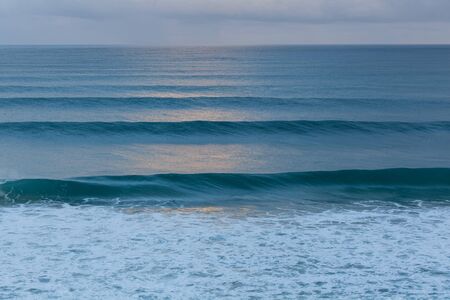 Deep turquoise ocean waves closeupの写真素材