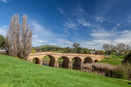 The iconic Richmond Bridge on bright sunny day. Richmond, Tasmania, Australiaの写真素材