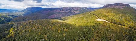 Aerial panorama of mountains and forest above Highland Lakes Road, Liffey, Tasmania, Australia