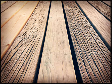 Old rustic wooden floor or table surface background. Vintage film look and feelの写真素材
