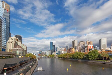 MELBOURNE - JAN 31 2016: view of Southbank footbridge and Yarra river from Princes bridge with office buildings in the background.のeditorial素材