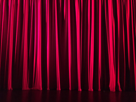 Red curtain in a theatre. Horizontal imageの写真素材