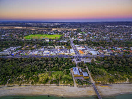 Aerial view of small shopping centre in Seaford and Nepean Highway at dusk. Melbourne, Victoria, Australiaの写真素材