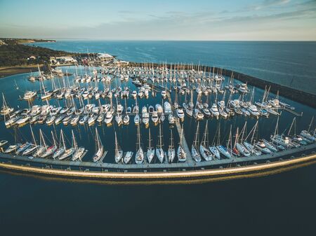 Aerial view of sailboats moored at beautiful marina in muted colors. Melbourne, Victoria, Australia.