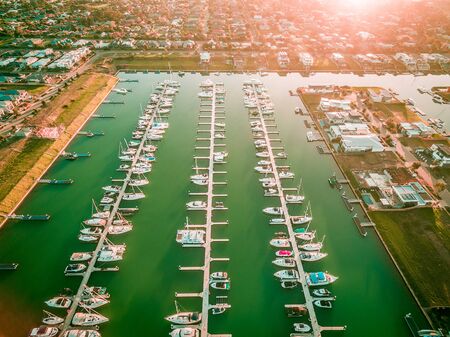 Aerial view of Safety Beach marina and suburb at sunsetの写真素材