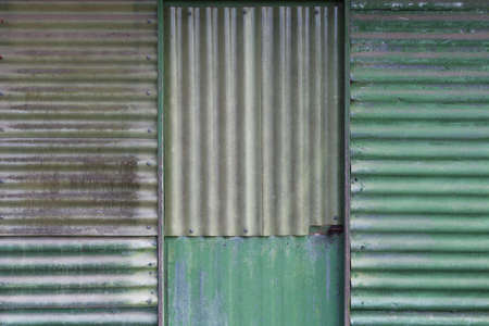 Galvanised metal sheets shed door background pattern