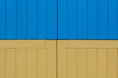 Blue and yellow wooden planks backgroundの写真素材