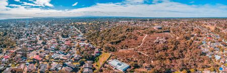 Aerial panorama of coastal suburb and parklands in Australiaの写真素材