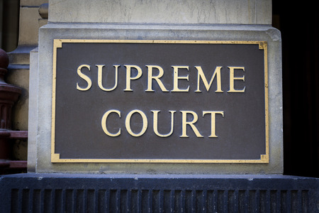 Supreme Court sign on a pillar closeupの写真素材