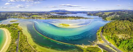 Aerial panorama of shallow ocean water and coastline. Narooma, NSW, Australiaの写真素材