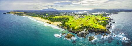 Aerial panoramic view of ocean coastline near Narooma, NSW, Australiaの写真素材