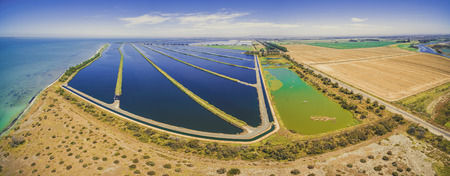 Beautiful aerial panorama of Western Treatment Plant and plowed fields at Cocoroc, Victoria, Australiaの写真素材
