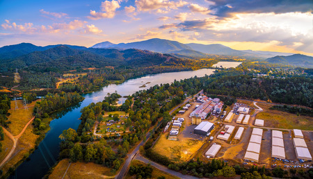 Aerial panorama of Goulburn River and mountains at sunset. Eildon, Victoria, Australiaの写真素材