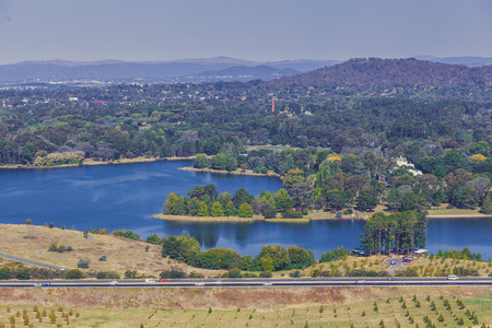 Aerial landscape of Lake Burley Griffin and mountains from National Arboretum, Canberra, Australia
