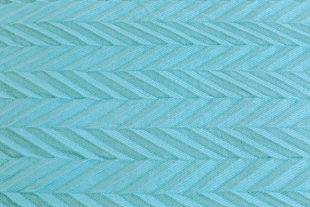 Soft turquoise fabric with arrow pattern background texture pattern