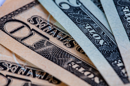 Extreme closeup of USD paper currency