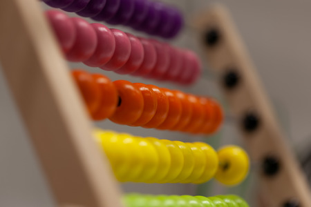 Colorful wooden abacus for kids education. Shallow depth of field