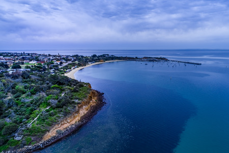 Aerial view of Mornington Pier, moored yachts and coastlineの写真素材