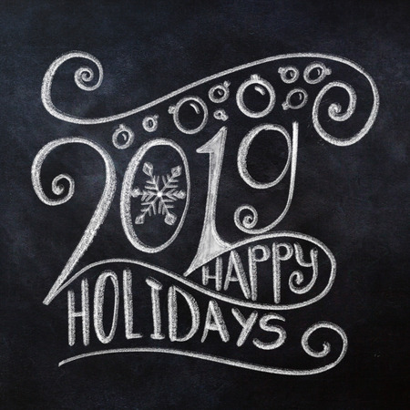 Happy Holidays 2019 chalk lettering on square blackboardの写真素材