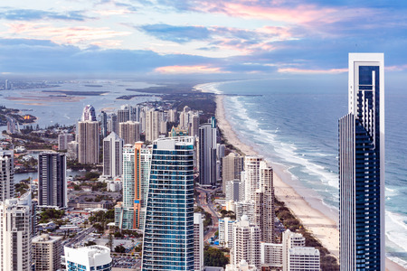 Skyscrapers right next to the ocean beach - Surfers Paradise, Gold Coast, Australiaの写真素材