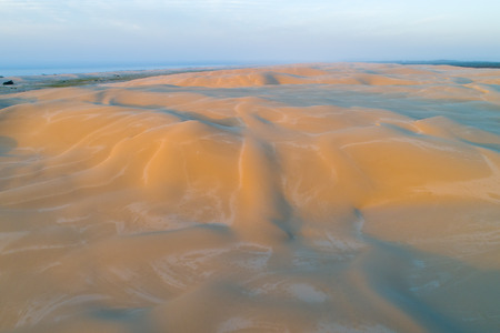 Aerial view of sunset over beautiful sand dunes. Anna Bay, New South Wales, Australiaの写真素材