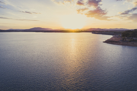 Sunset over Hume Dam and Lake Hume with copy space - aerial landscapeの写真素材