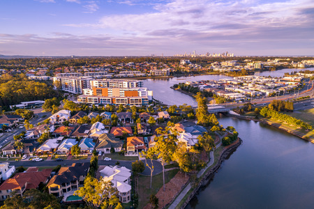 Varsity Lakes suburb luxury real estate at sunset. Gold Coast, Queensland, Australia - aerial landscapeの写真素材