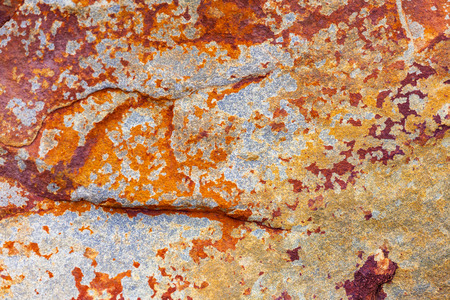 Rusty grunge texture on large stoneの写真素材