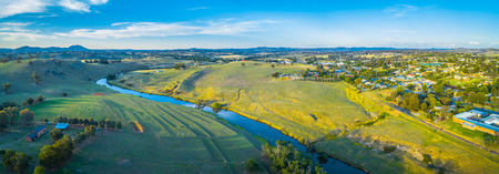 Wide aerial panoram of Yass river and surrounding countryside at sunset in New South Wales, Australiaの写真素材