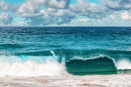 Beautiful clouds and breaking ocean wave - scenic seascape of Australiaの写真素材