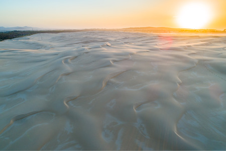 Sunrise over pristine white sand dunesの写真素材