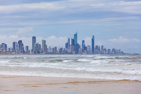 Gold Coast skyline and ocean waves. Surfers Paradise, Queensland, Australiaの写真素材