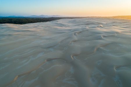 Sand dunes at sunrise - aerial viewの写真素材