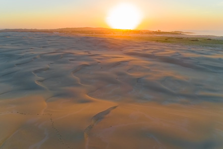 Breathtaking sunrise over famous sand dunes at Anna Bay, New South Wales, Australiaの写真素材