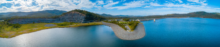 Wide aerial panorama of Hinze Dam and lake. Advancetown, Queensland, Australiaの写真素材