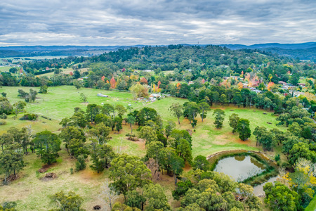 Rural area with trees and grasslands in Victoria, Australia - aerial landscapeの写真素材