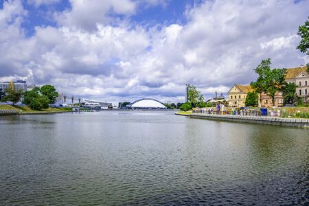 The river Svislach and ice skating rink in the distance in Minsk, Belarusの写真素材