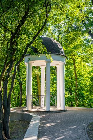 Small beautiful gazebo in the city park of Gomel, Belarusの写真素材