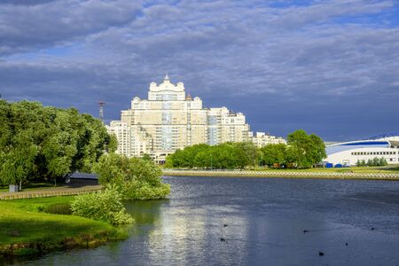 Huge residential buildings complex on banks of river Svislach in Minsk, Belarusの写真素材