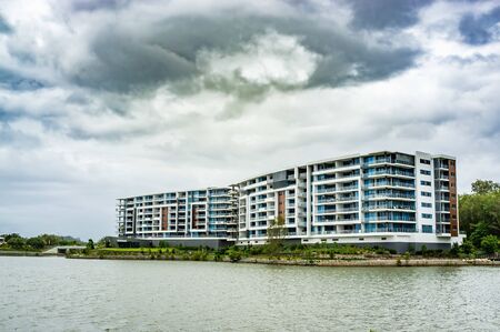 Residential luxury bildings on a lake at Varsity Lakes suburb near Gold Coast, Queensland, Australiaの写真素材