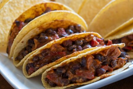 Yummy vegetarian tacos extreme closeup with shallow focusの写真素材