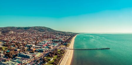 Aerial panorama of Dromana suburb and long wooden pier in Melbourne, Australiaの写真素材