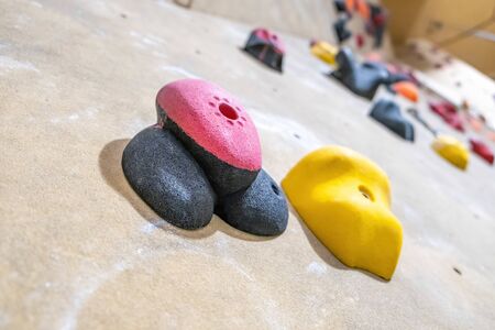 Large climbing hold in a gym with shallow focusの写真素材