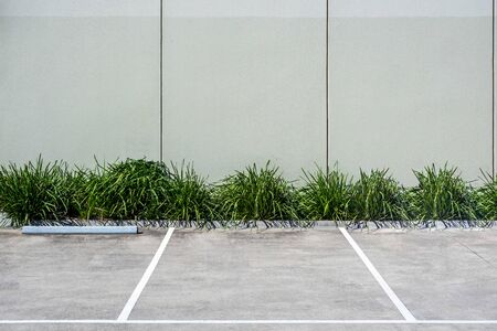 Unoccupied parking space in industrial area with copy spaceの写真素材