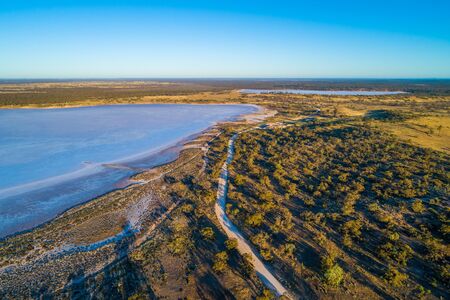 Salt lake in the desert at sunrise. Victoria, Australia.の写真素材