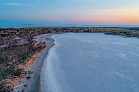 Aerial view of salt lake at sunset in Australiaの写真素材