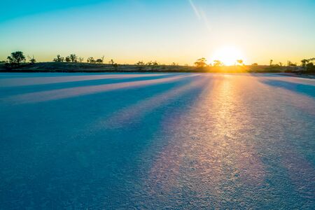 Sunset over salt lake in the desertの写真素材